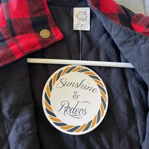 Sunshine and Rodeos vest. Never been worn. Size medium